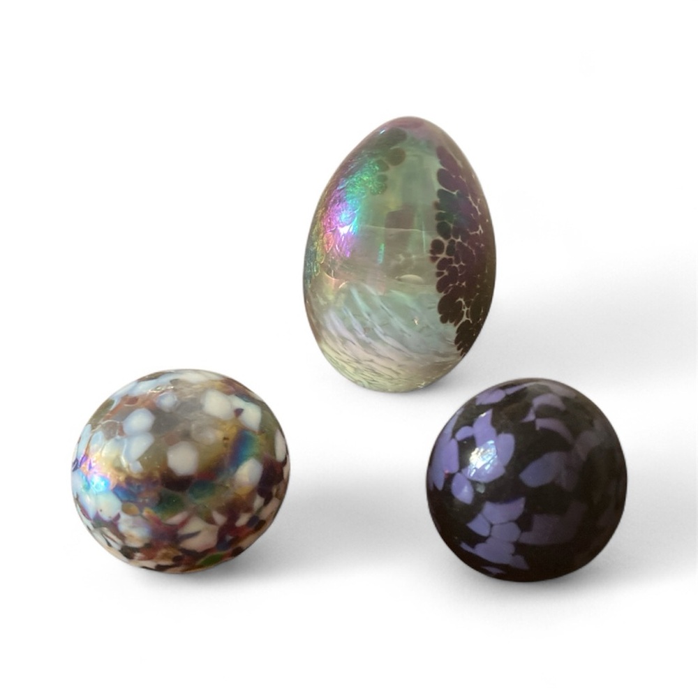 Trio of small paperweights